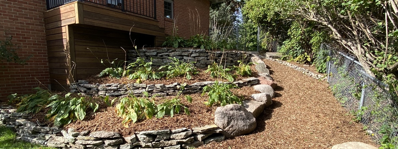 Edina Yard Renovation with Crushed Granite Walkway and Rebuilt Flagstone Terraces