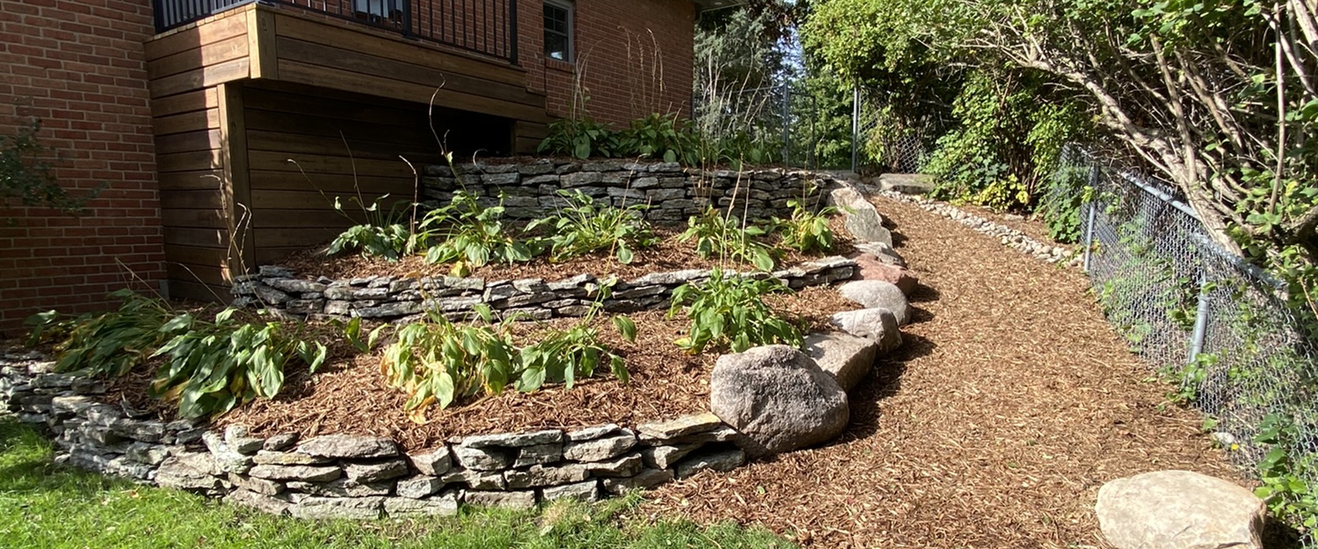 Edina Yard Renovation with Crushed Granite Walkway and Rebuilt Flagstone Terraces