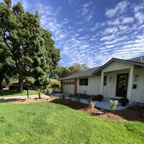 Finished Edina front yard with trimmed trees, mulched beds, and healthy lawn