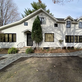 Finished Belgard paver walkway improving access across the front of a Buffalo home